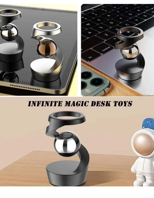 Load image into Gallery viewer, Gravity Defying Kinetic Desk Toy
