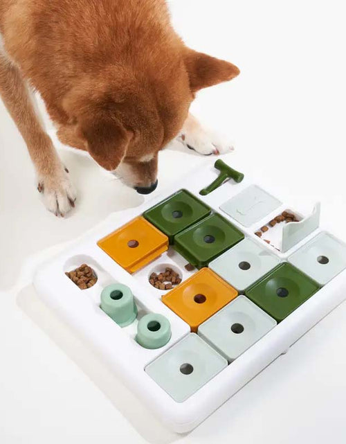 Load image into Gallery viewer, Interactive BPA-Free Dog Puzzle Feeder - Slow Eating Toy for Puppies &amp; Adults.
