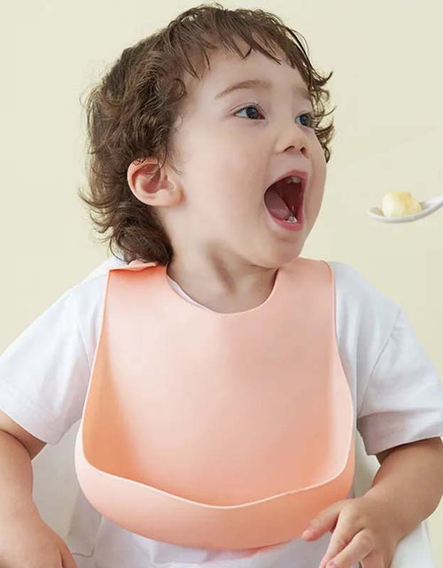 Load image into Gallery viewer, Soft Waterproof Silicone Baby Bib with Food Catcher
