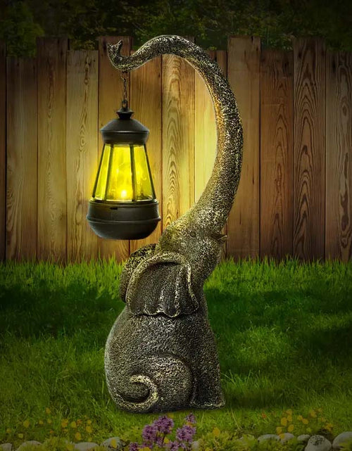 Load image into Gallery viewer, Solar Powered Elephant Statue - Color-Changing LED Garden Decor
