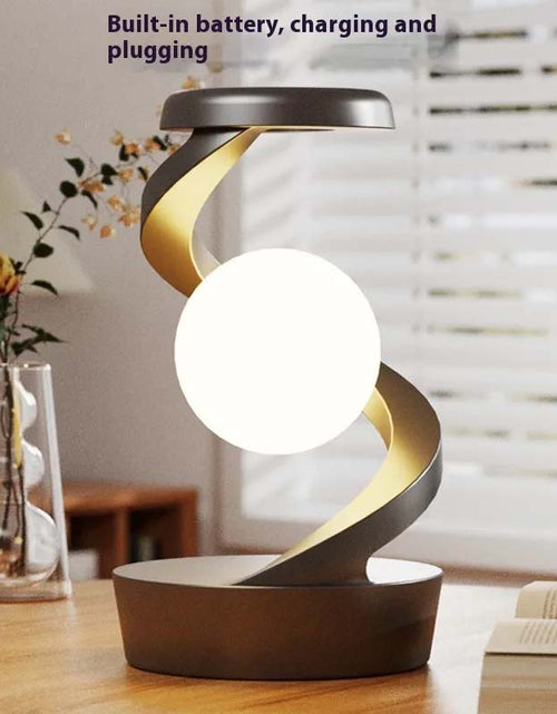 Load image into Gallery viewer, Rotating Moon Desk Lamp With Phone Wireless Charging
